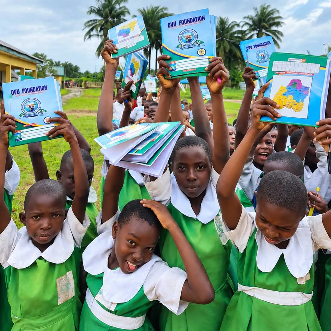 Children happy to receive books from Ovu Foundation